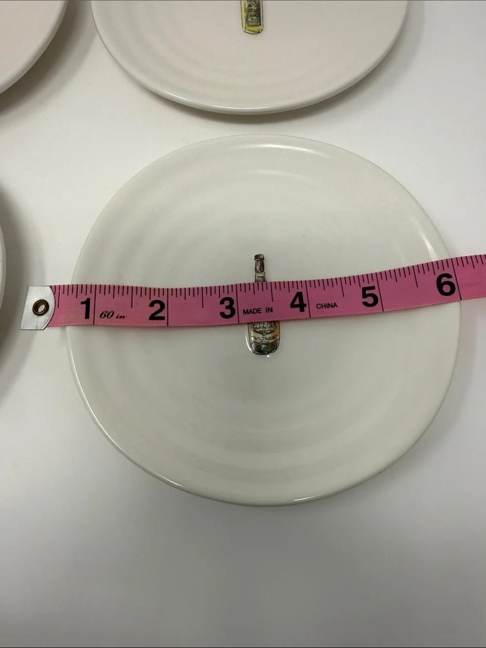Williams Sonoma Cream Ceramic Dinner Plates with Wine Bottle Motifs - Set of 4
